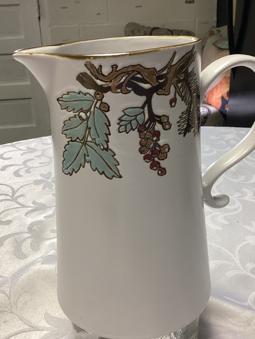 FAll themed pitcher tall cylindrical shape. Gold details too